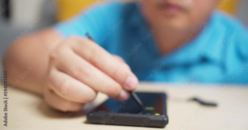 Men use stylus pen technology on a smartphone to write and work with digital applications. Men use stylus pen technology on a smartphone to write and work with digital applications.
