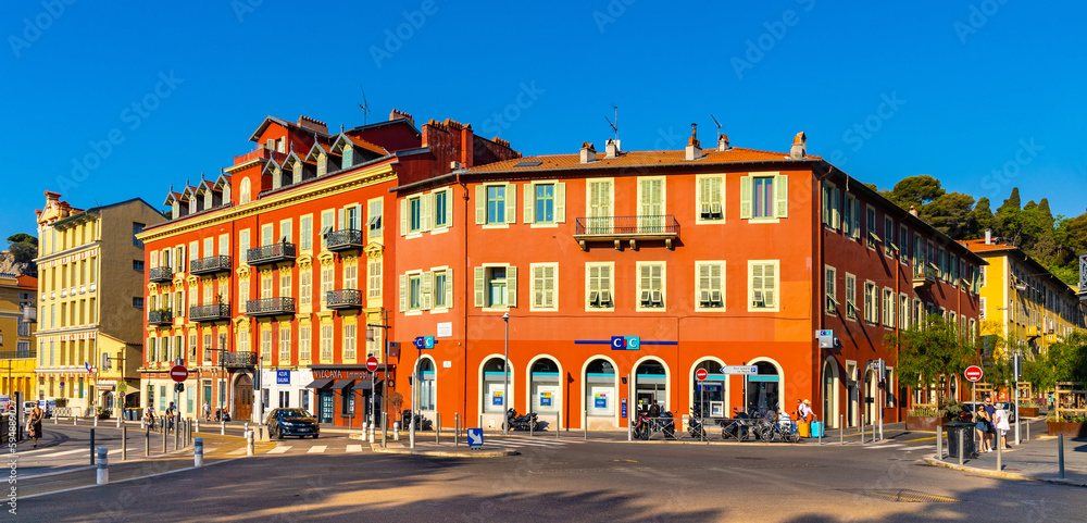 Colorful tenement houses along Quai Papacino street in historic Nice Port and yacht marina district on French Riviera in France