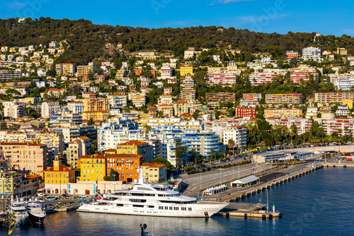 Nice Port and yacht marina district sunset panorama with Mont Boron hill at French Riviera of Mediterranean Sea Harbor in France