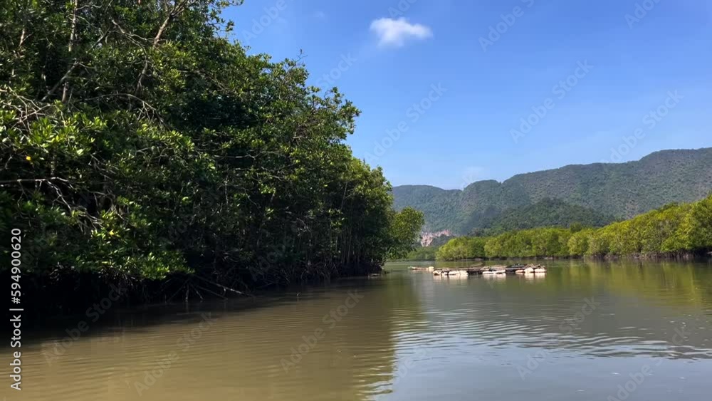 View from a traditional boat on Songkhla Lake in Phatthalung Province, Thailand View from a traditional boat on Songkhla Lake in Phatthalung Province, Thailand