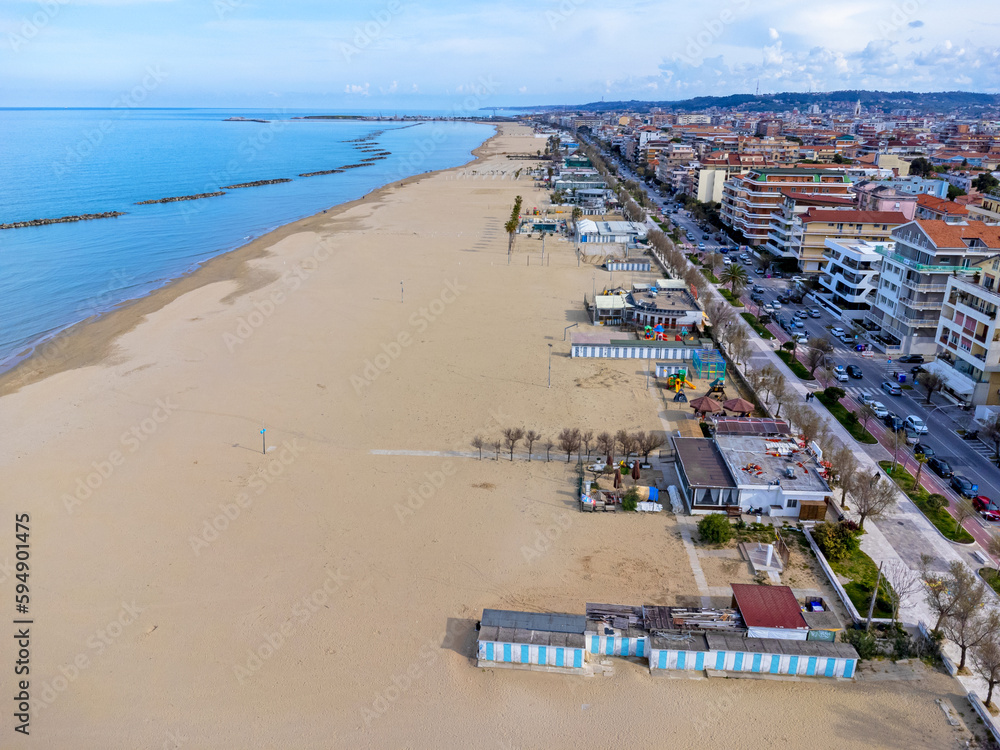 Aerial view landscape Italy Pescara, coast , beach, sea, promenade, buildings and apartments.