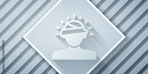 Paper cut Concussion, headache, dizziness, migraine icon isolated on grey background. Paper art style. Vector