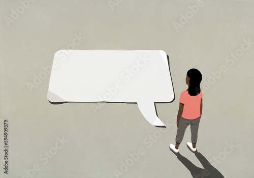 Woman looking down at communication speech bubble
 photo