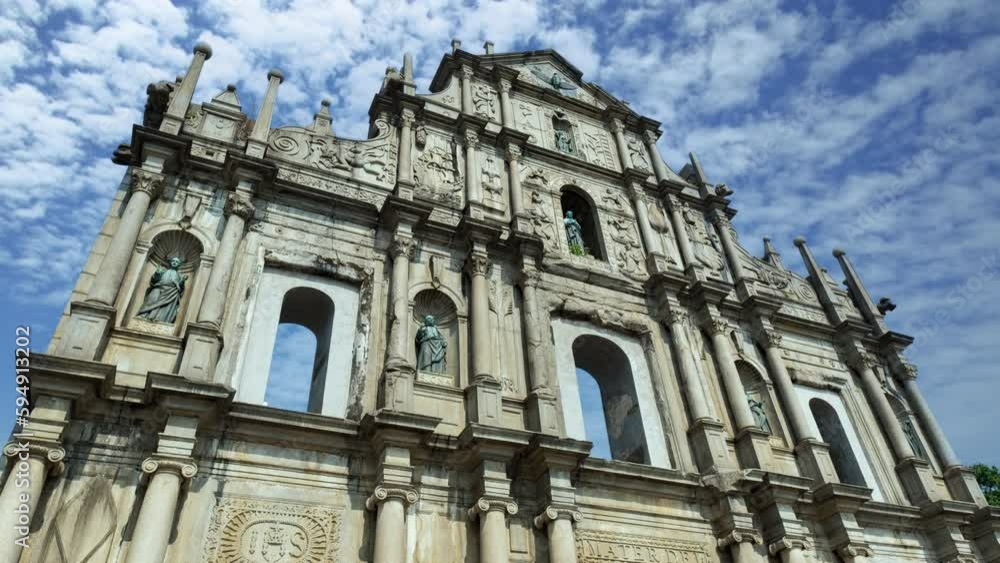 Ruin of St.Paul cathedral time lapse on a sunny day, the travel destination landmark of Macau, China. Ruin of St.Paul cathedral time lapse on a sunny day, the travel destination landmark of Macau, China.