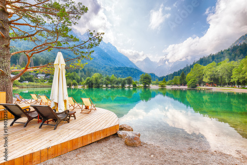 Amazing landscape on Jasna lake with beautiful reflections of the mountains. photo