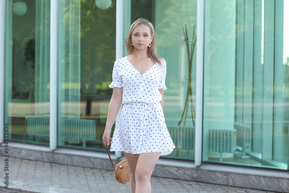 young beautiful woman in dress