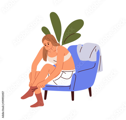 Woman taking on clothes, getting ready, dressing up. Young girl in underwear sitting in armchair at home, putting on, wearing socks on feet. Flat vector illustration isolated on white background