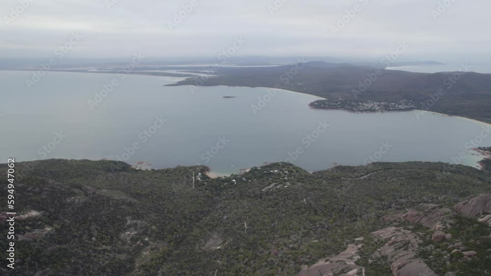 Panorama Of Freycinet National Park From Coles Bay To Wineglass Bay In Tasmania, Australia. aerial pan right Panorama Of Freycinet National Park From Coles Bay To Wineglass Bay In Tasmania, Australia. aerial pan right