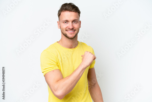 Young blonde caucasian man isolated on white background proud and self-satisfied