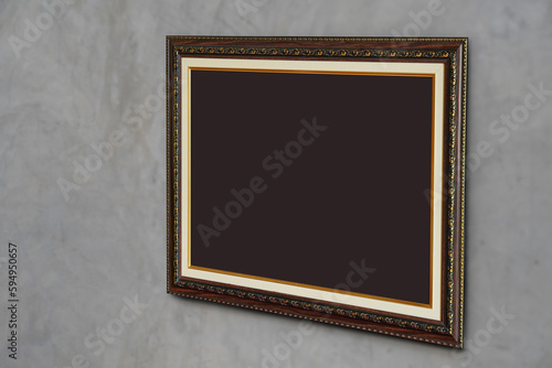 brown paper on brown and gold rectangle frame on cement wall background, object, decor, fashion, gift, photo, banner, template, copy space