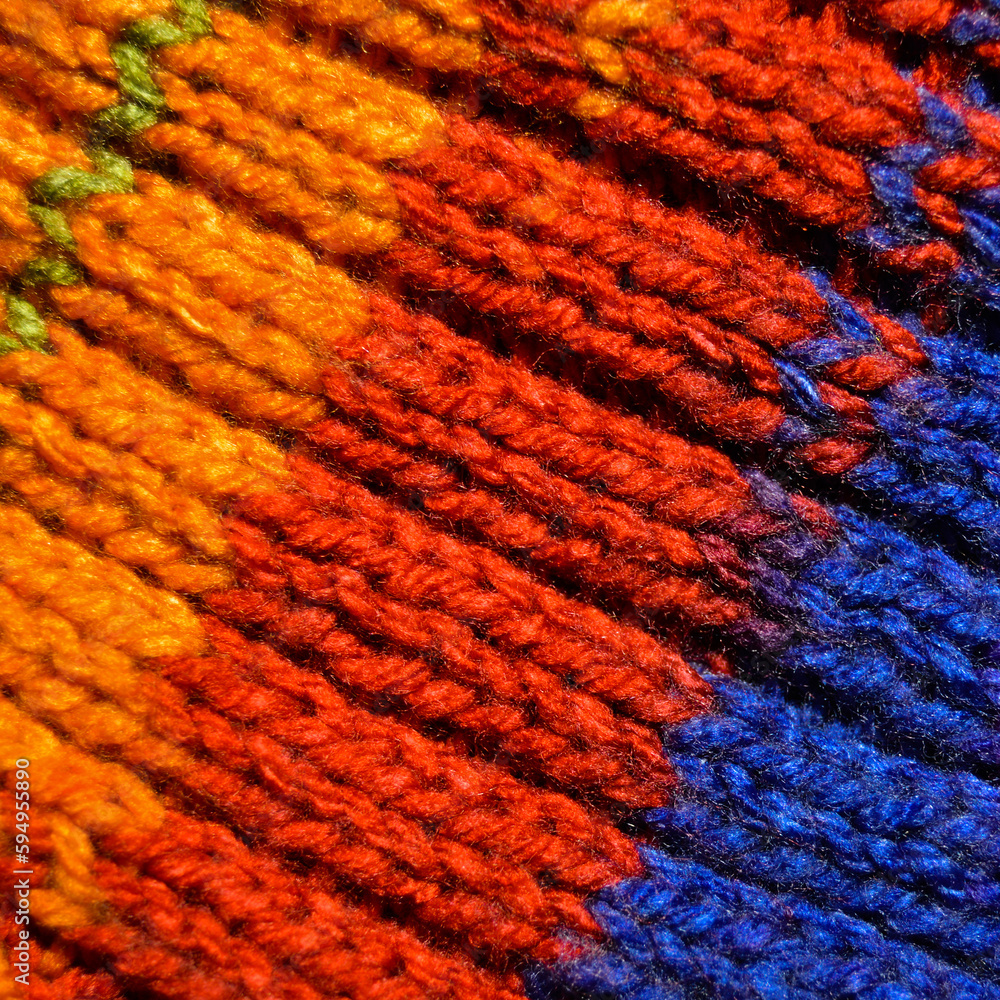 Handmade knitted fabric colored wool background texture