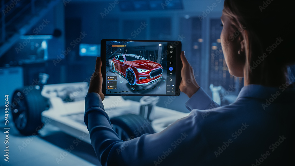 Automotive Engineer Working on Electric Car Chassis Platform, Using