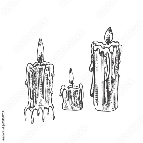 Hand drawn set of burning candles. Vector illustration of a sketch style. Vintage halloween or Christmas drawing.