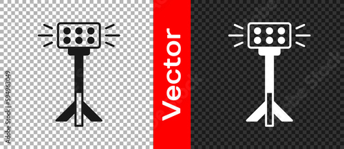 Black Studio light bulb in softbox icon isolated on transparent background. Shadow reflection design. Vector
