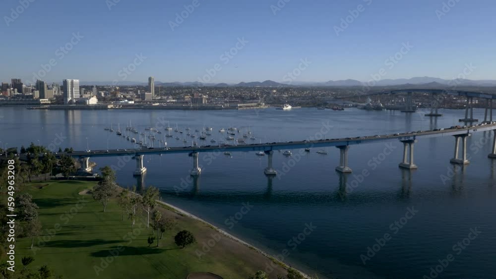 Drone shot over Coronado Bridge with harbor and skyline on a sunny day Drone shot over Coronado Bridge with harbor and skyline on a sunny day