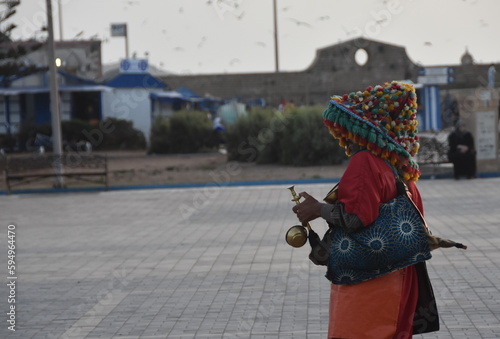 water seller in the streets of Essaouira, Morocco photo