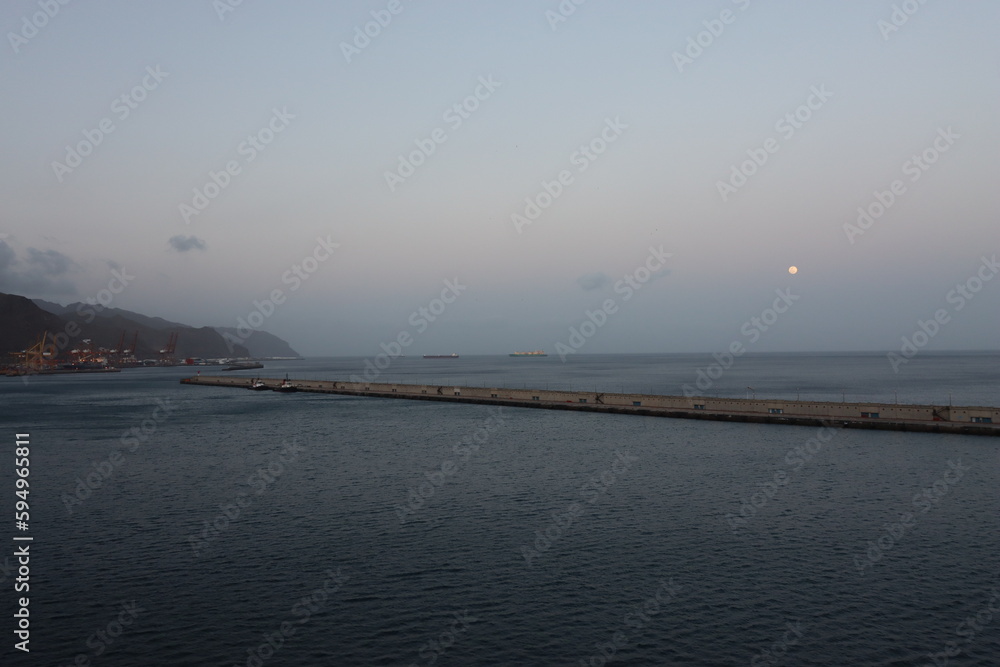 Seascape with full moon over the port of Santa Cruz, Tenerife Seascape with full moon over the port of Santa Cruz, Tenerife