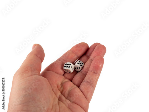 There are two dice in hand on a white background. Close-up.