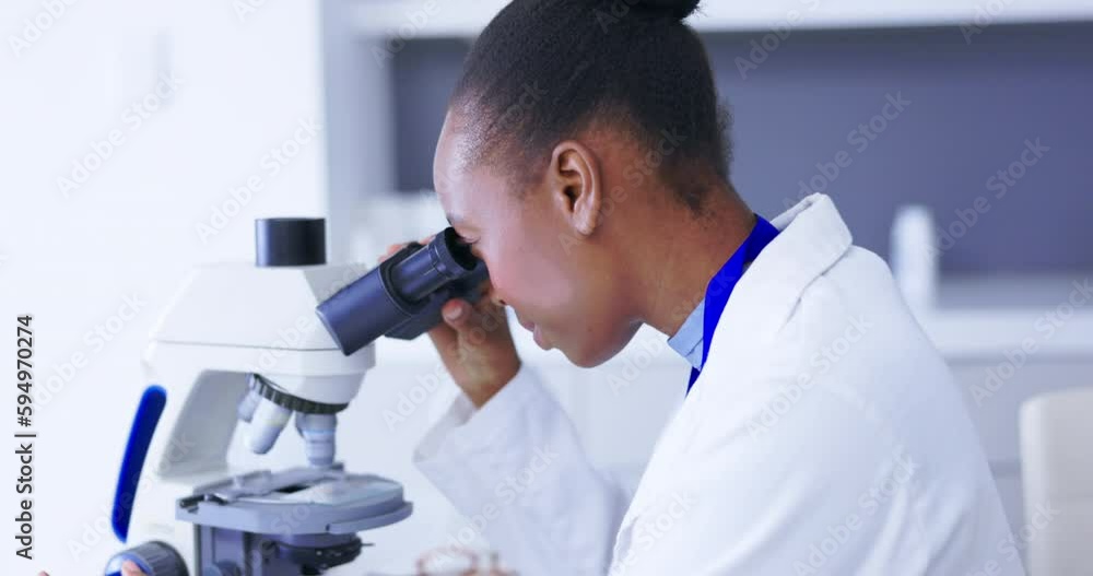 Black woman, scientist and face with microscope, analysis of DNA for science study and excited about results. Doctor record data on tablet, female smile at discovery with medical research in lab Black woman, scientist and face with microscope, analysis of DNA for science study and excited about results. Doctor record data on tablet, female smile at discovery with medical research in lab