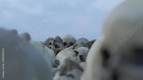 A pile of human Skulls. 3D cinematic.