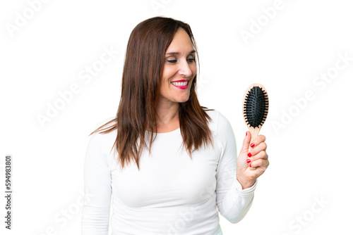 Middle age woman with hair comb over isolated chroma key background with happy expression