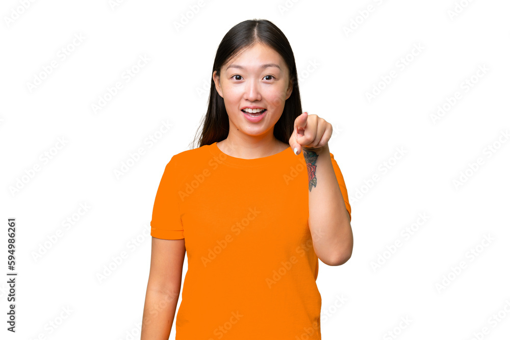 Young Asian woman over isolated background looking up and with surprised expression Young Asian woman over isolated background looking up and with surprised expression