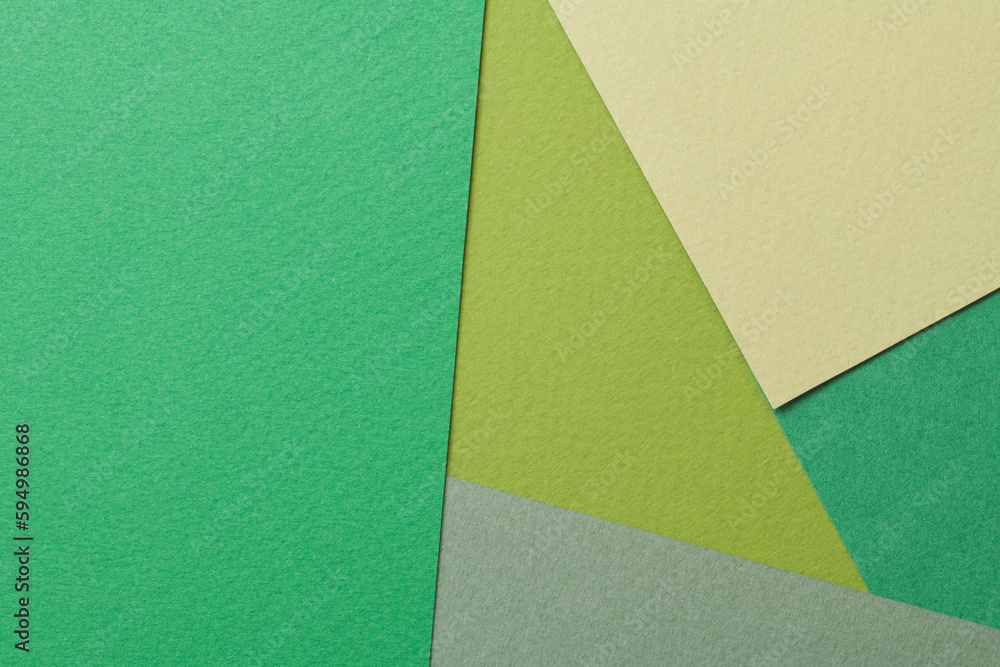 Rough kraft paper background, paper texture different shades of green. Mockup with copy space for text Rough kraft paper background, paper texture different shades of green. Mockup with copy space for text