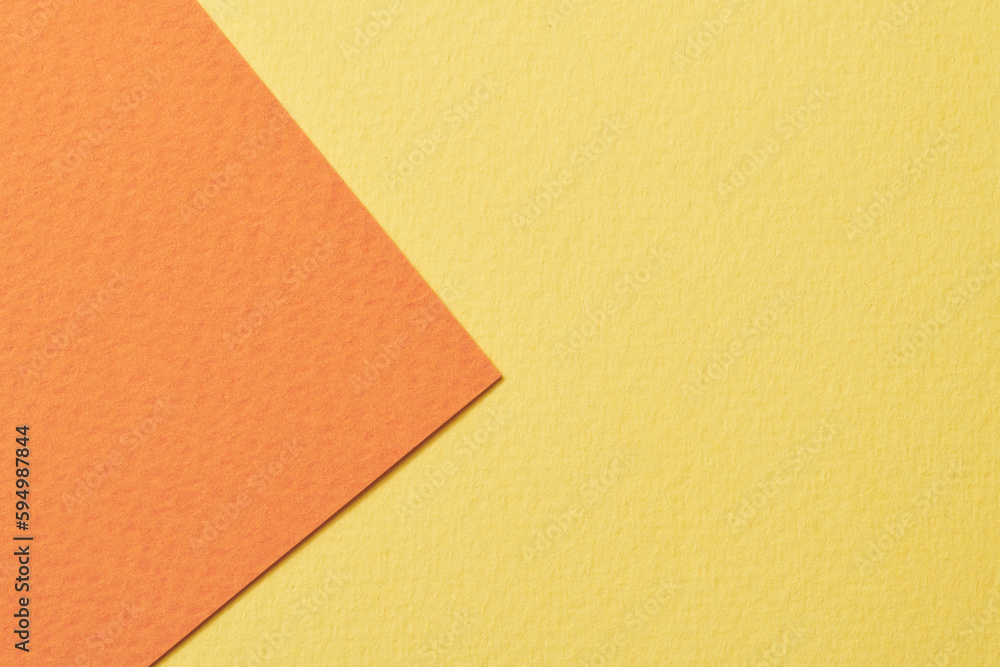 Rough kraft paper background, paper texture orange yellow colors. Mockup with copy space for text Rough kraft paper background, paper texture orange yellow colors. Mockup with copy space for text