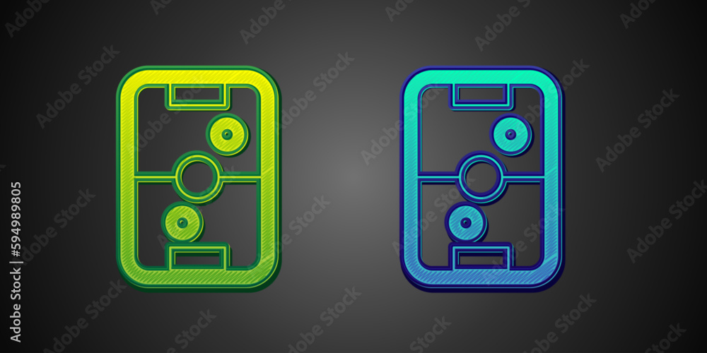 Green and blue Air hockey table icon isolated on black background. Vector