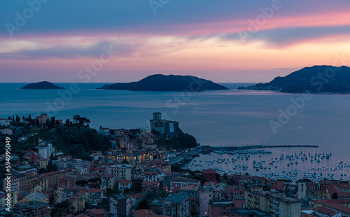 Sunset in Lerici - Liguria Italy: Sunset over the Gulf of La Spezia Liguria Italy, in the background Portovenere, Palmaria Island and Tino photo