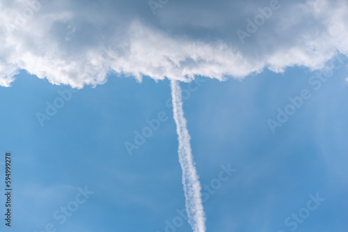 contrail of a rocket launch in the blue sky in Ukraine