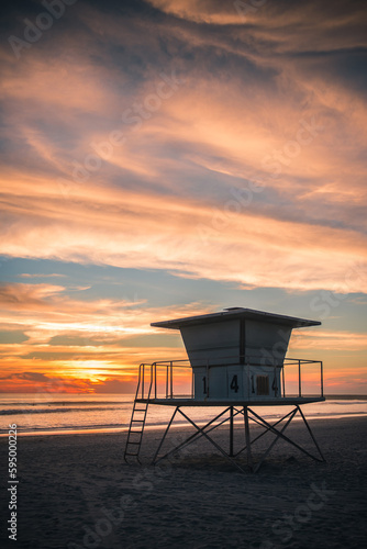 Lifeguard booth on the beach during sunset. California beach.