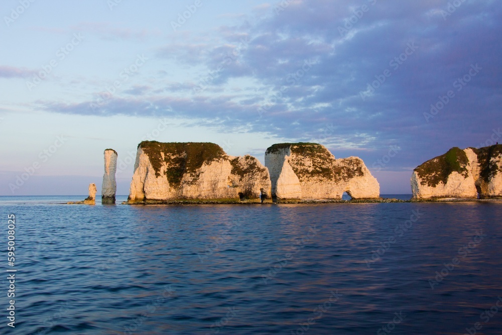 Mesmerizing view of Old Harry Rocks, Dorset against the blue sky