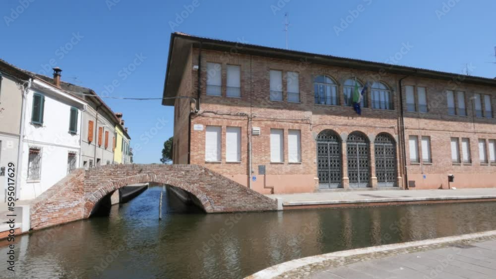 Comacchio, Italy, view of the Theater bridge and the Carducci school