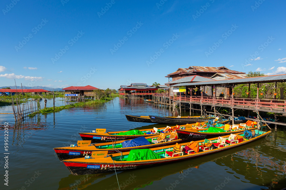 Mandalay, Myanmar, November 22, 2016: Myanmar people traveling by boat