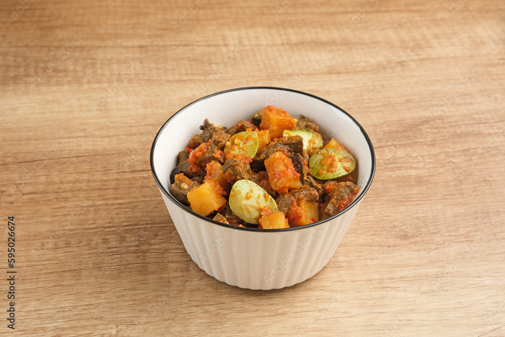 Sambal Goreng Ati Kentang, Indonesian traditional food. Savory and spicy
Sambal Goreng Ati Kentang, Indonesian traditional food. Savory and spicy