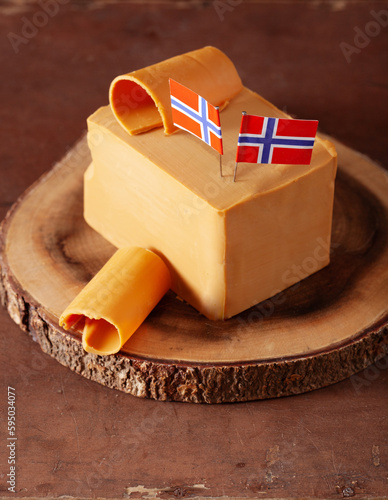 Norwegian brunost traditional brown cheese block photo