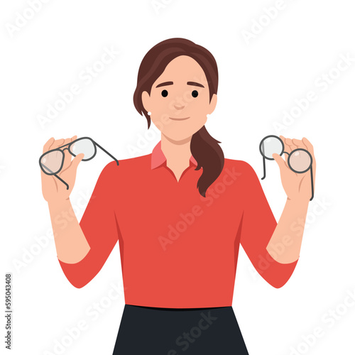Woman holds glasses and lenses in hands choosing convenient and useful product for eye care. Portrait of smiling girl ophthalmologist offering various ways to improve vision