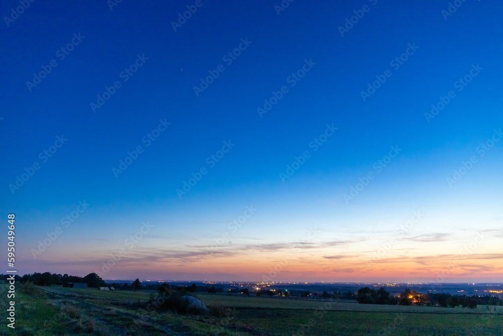 Panoramic view at the blue hour on a landscape