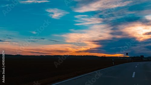 Sunset with dramatic clouds near Zeholfing, Isar, Bavaria, Germany