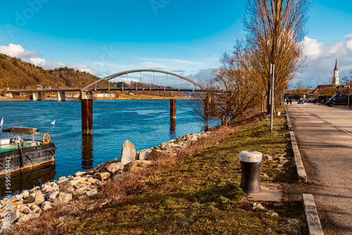 Winter landscape with a bridge on a sunny day near Vilshofen, Danube, Bavaria, Germany photo