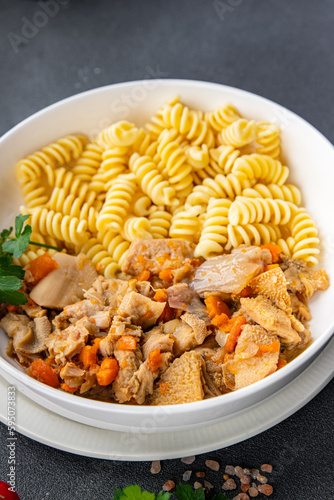 meat tripe pasta fusilli fresh meal food snack on the table copy space food background rustic top view