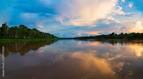 Amazonia - wall of green tropical forest of the Amazon jungle, green hell of the Amazonia. Selva on the border of Brazil and Peru. Yavari river in Javari Valley, (Valle del Yavarí) South America.