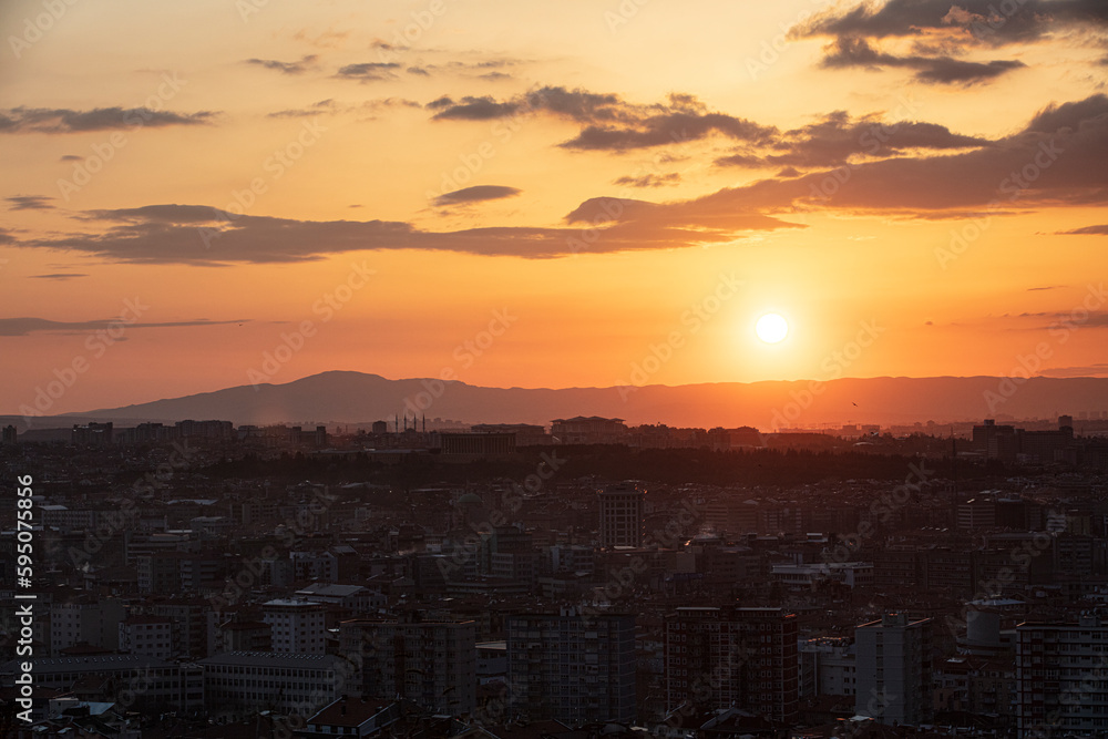  Panorama view of the downtown area of the city of Ankara, Turkey with buildings and mosques seen from Ankara Castle (Ankara Kalesi) on a sunset day.