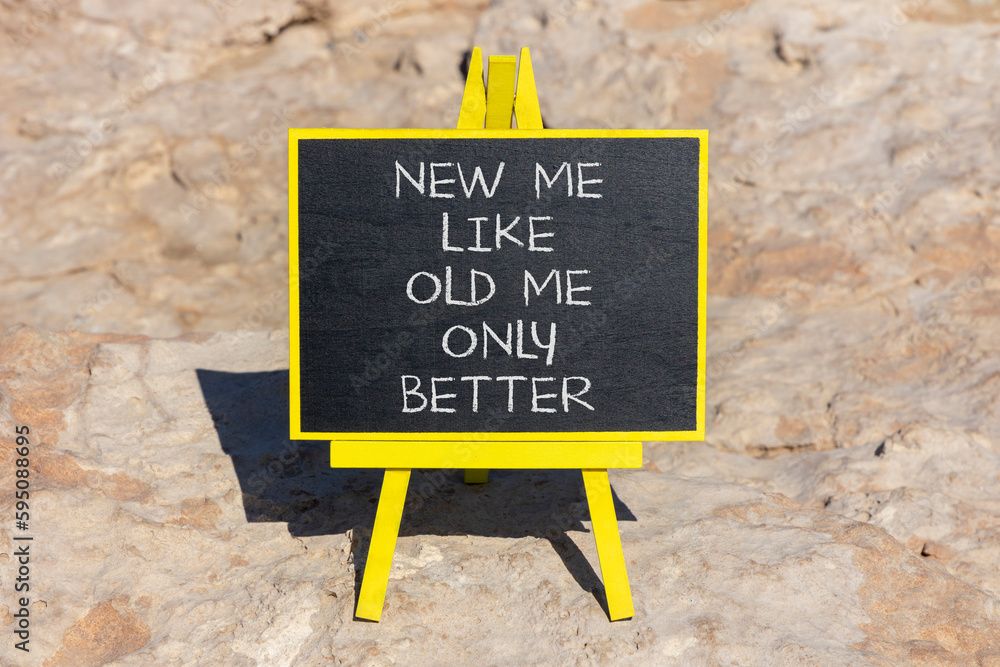 Fototapeta premium Concept of building success foundation and new me symbol. Concept words New me like old me only better on black chalk blackboard on a beautiful stone background. New me symbol. Copy space.