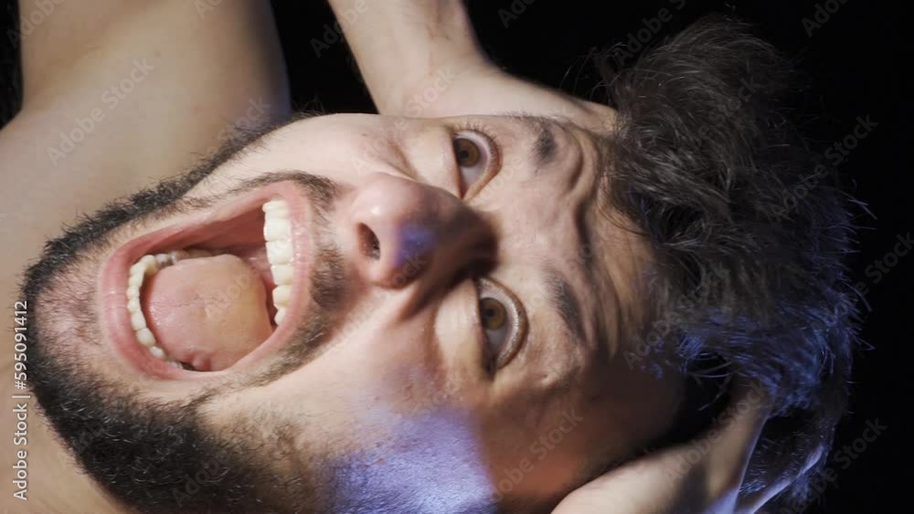 Vertical Video of Mentally ill man going crazy and shouting.
Mentally deranged man screaming and going crazy in a dark room.
Vertical Video of Mentally ill man going crazy and shouting.
Mentally deranged man screaming and going crazy in a dark room.