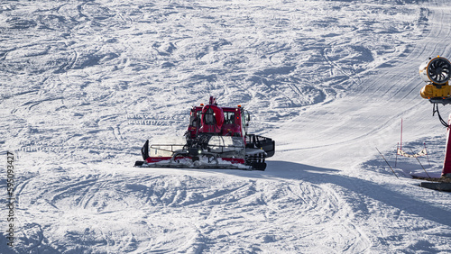 Snowcat, ratrack - machine for snow preparation while working in Alpe D'huez - One of the most popular ski resorts in the Alps in France