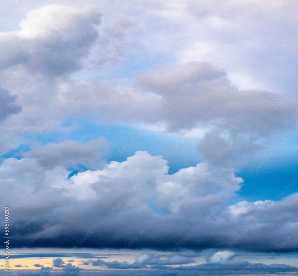 French Polynesia, Moorea. Clouds over island at sunrise.
