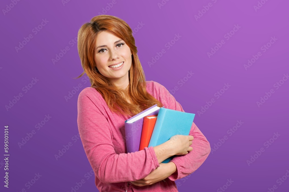 Young student has an idea and posing on background