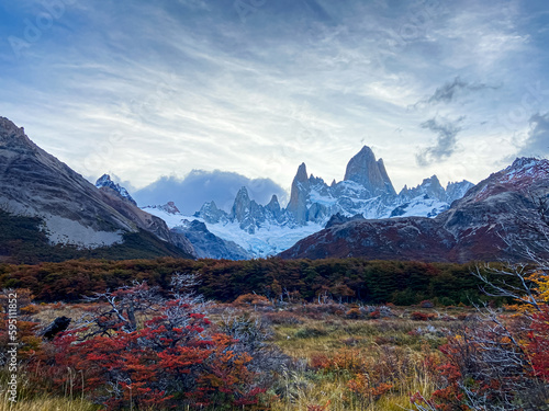 Region of the southernmost of the Argentinean Patagonian lakes, its colorful flowers, mountains and gorges covered by the white mantle of snow.